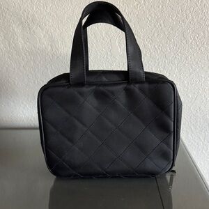 Black quilted makeup bag